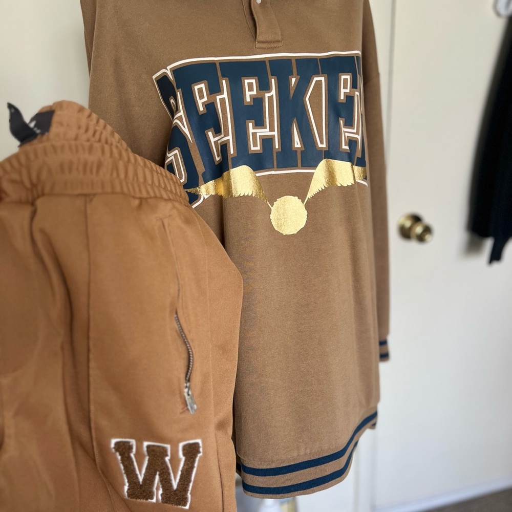 Brown Seeker Sweatshirt with Gold and Blue Accents